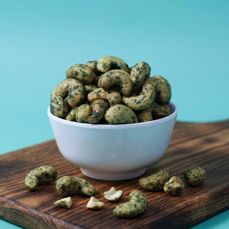 Yathrib Za'atar roasted cashews in a bowl, showcasing seasoned, crunchy nuts with za'atar spice coating.