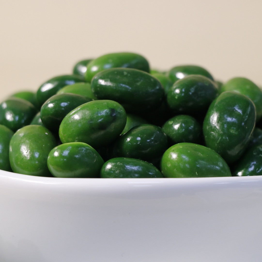 Yathrib Premium Matcha Pistachio Dragee showing green matcha-flavored coating with chopped pistachios inside