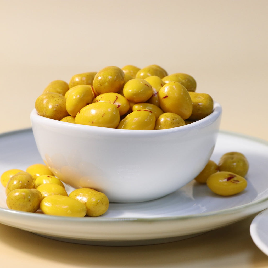 Yathrib Saffron Almond Biscuit Dragee featuring saffron-infused biscuits with almonds in a decorative packaging