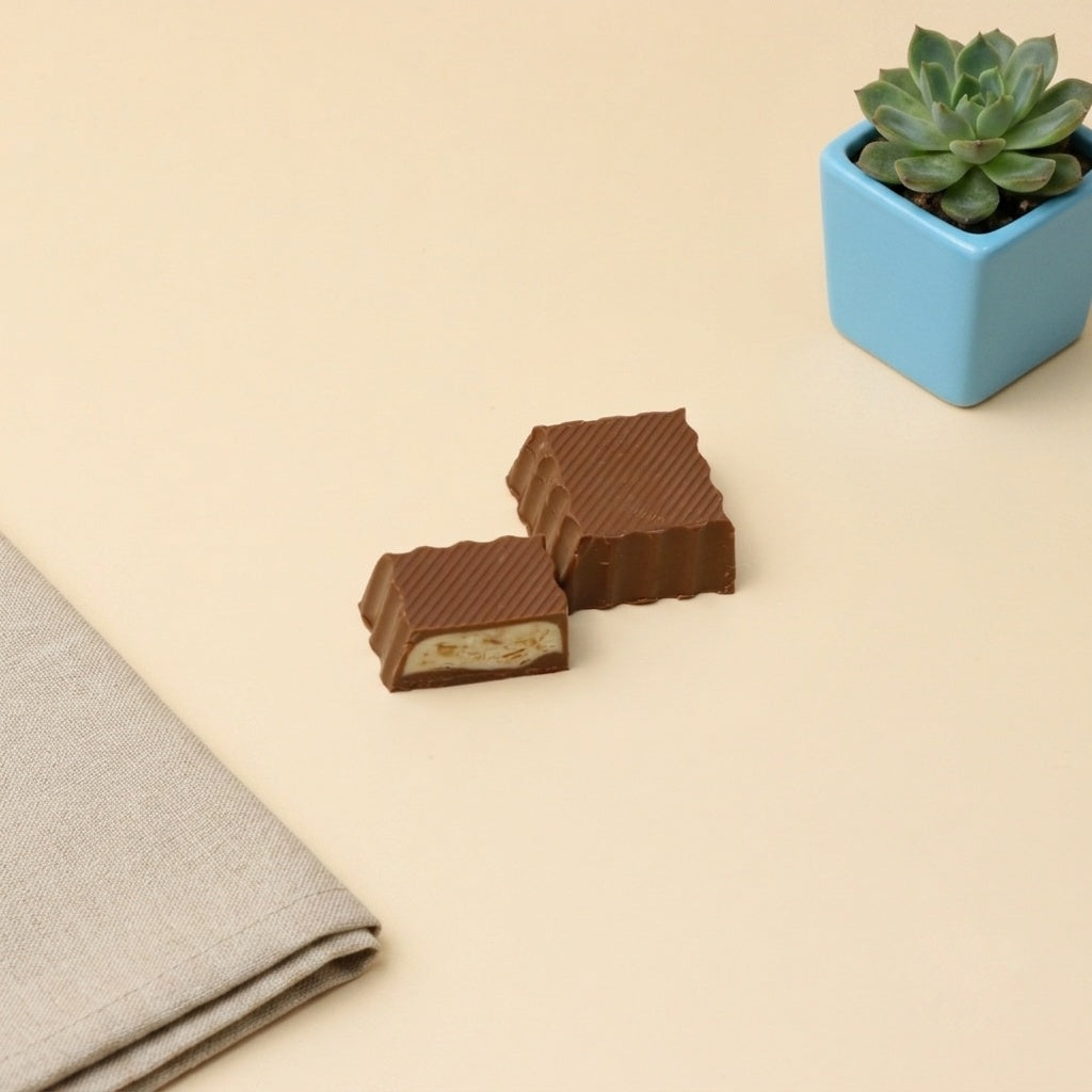 Yathrib Avorico coconut cream chocolate bar with creamy coconut filling and smooth chocolate coating.