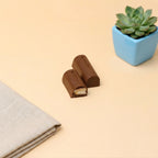 Yathrib Biscocello biscuit jelly chocolate in a wrapper, showcasing the sweet, layered biscuit and chocolate filling inside.