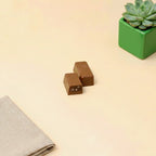 Yathrib Dolcanto crispy chocolate bar with a rich, crunchy texture and smooth chocolate coating, served on a white plate.