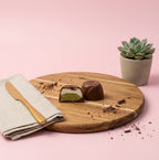 Yathrib Filacchio cotton candy with pistachio and chocolate flavors, colorful spun sugar treat on a stick.