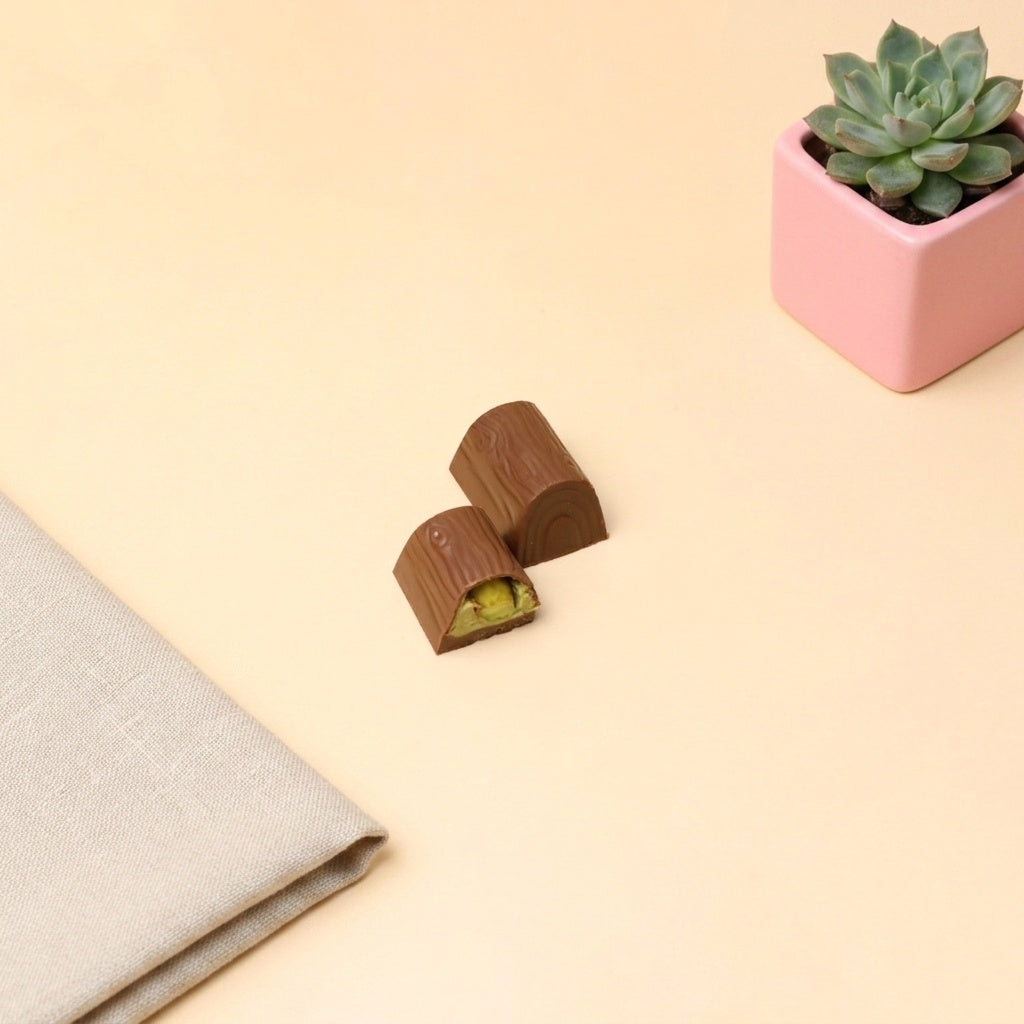 Yathrib Pistacore pistachio chocolate bar with visible chopped pistachios and smooth chocolate coating.